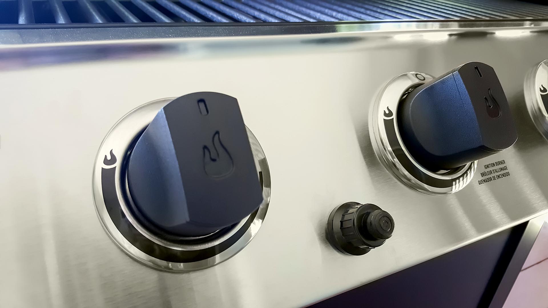 Closeup of Four Burner Gas Barbecue Grill control knobs